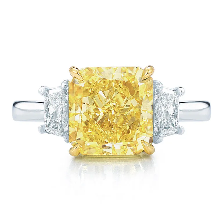 Engagement Ring with a Radiant Yellow Diamond and Side Stones
