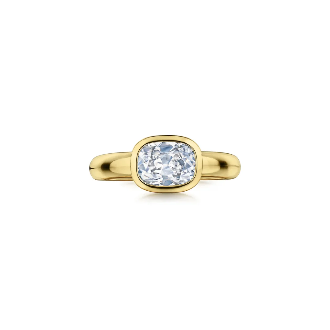 DOMED SIDE-SET BEZEL DIAMOND RING